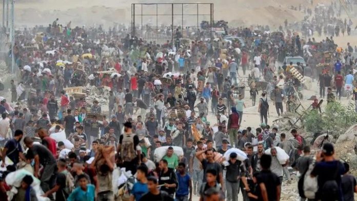 warga-palestina-mengambil-bantuan-kemanusiaan-dari-ghf-yang-didukung-as-israel-di-gaza-1754045805867_169